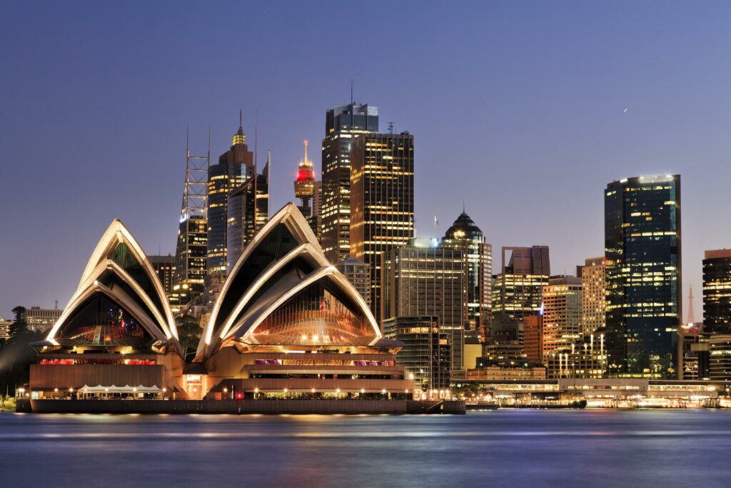 ciudad de sydney iluminada por la noche con WAYAO